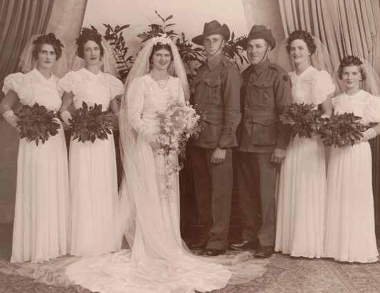 Evelyn Randell and Cecil Hannaford wedding, studio portrait with their wedding party. Married on 31 May 1941
