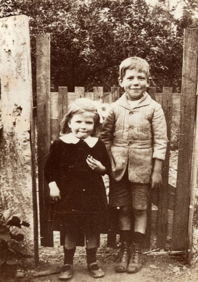 Evelyn Randell (1916-2006) age 5, with 'Pete', one of her bothers.She married Cecil Hannaford.
